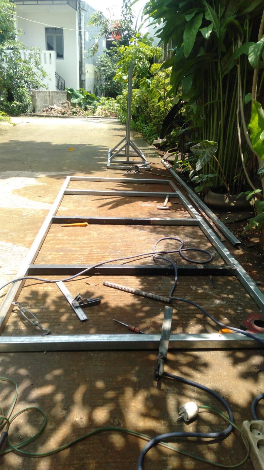 Pasang canopy carport atap spandek alderon - DEOTA TEKNIK